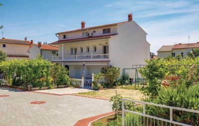 Dům PERKIC / Apartmány TINA & MARJETKA