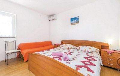 Dům PERKIC / Apartmány TINA & MARJETKA