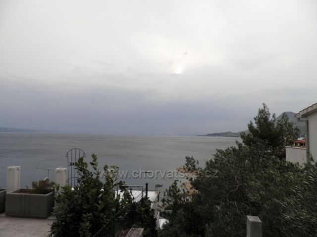 Západ slunce do oblak v Nemiře